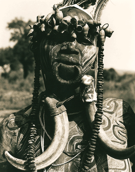 <strong>SECOND PLACE</strong> <em>Woman with Tusks, Ethiopia,</em> Andrew Geiger 