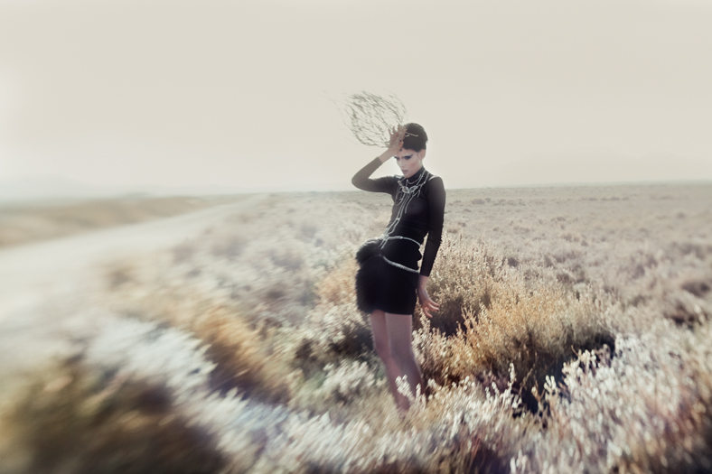  Top see-through: <strong>Andres Sarda</strong>  Black skirt with feathers: <strong>Gucci</strong>  Black shorts boots: <strong>Ash</strong>  Frame work in Swarovski: <strong>D´Squared</strong>