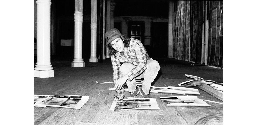 PORTRAIT Gordon Matta-Clark installing Walls paper, 1972.Gordon Matta-Clark courtesy of the Estate of Gordon Matta-Clark and David Zwirner Gallery Photograph by Cosmos Andrew Sarchiapone. (Click to enlarge)