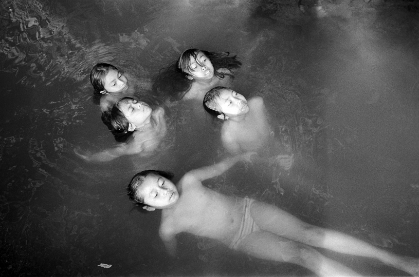 <em>Balinese girls playing in the river</em>, Marcela Taboada